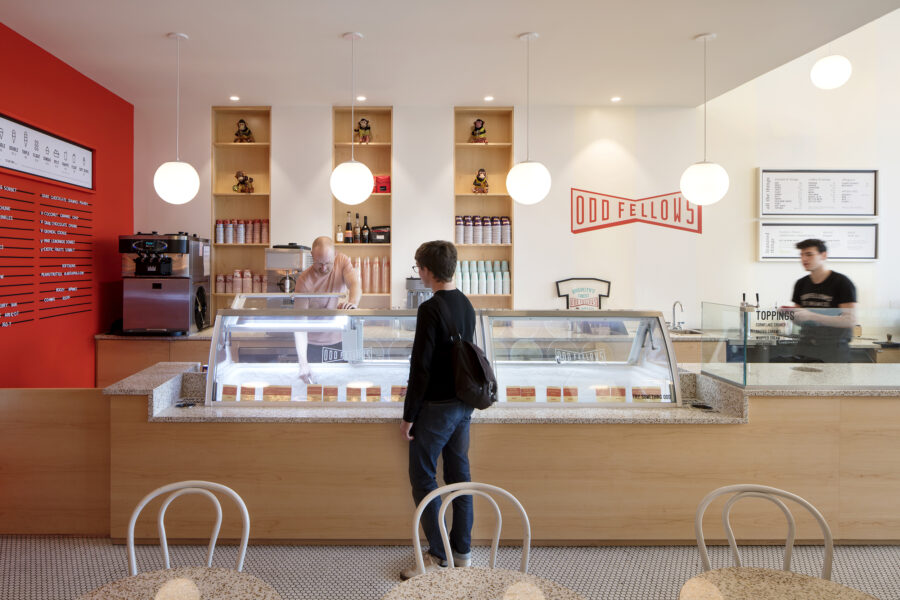 serving counter warm wood shelving