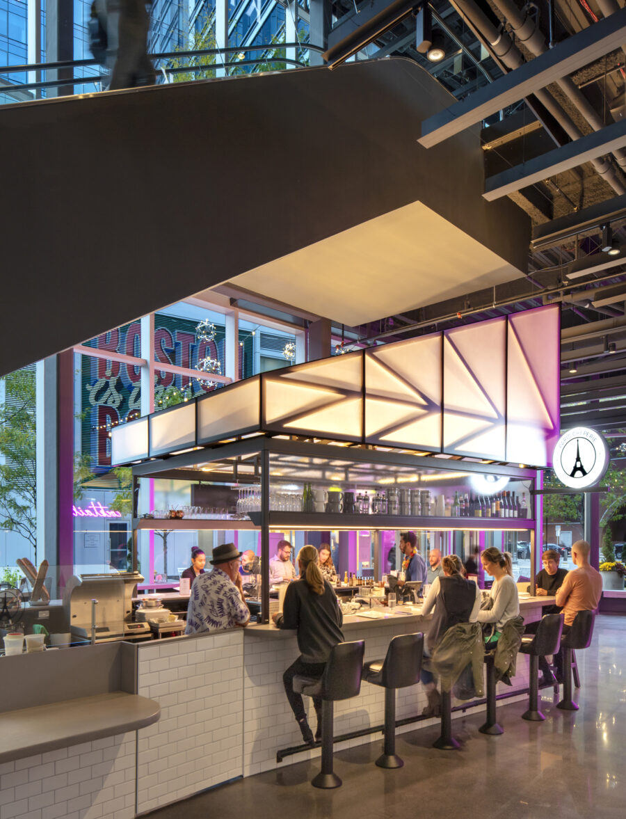translucent metal lattice bar under escalator