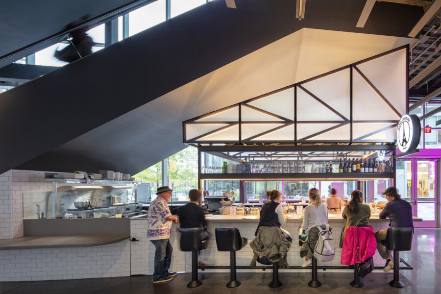 translucent metal lattice bar under escalator
