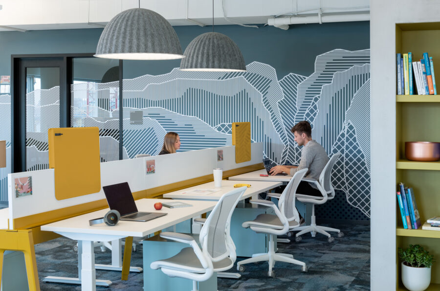 Workspace wall graphic teknion desks muuto lighting
