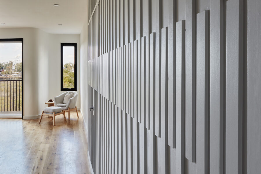 wood feature wall curved balcony nook