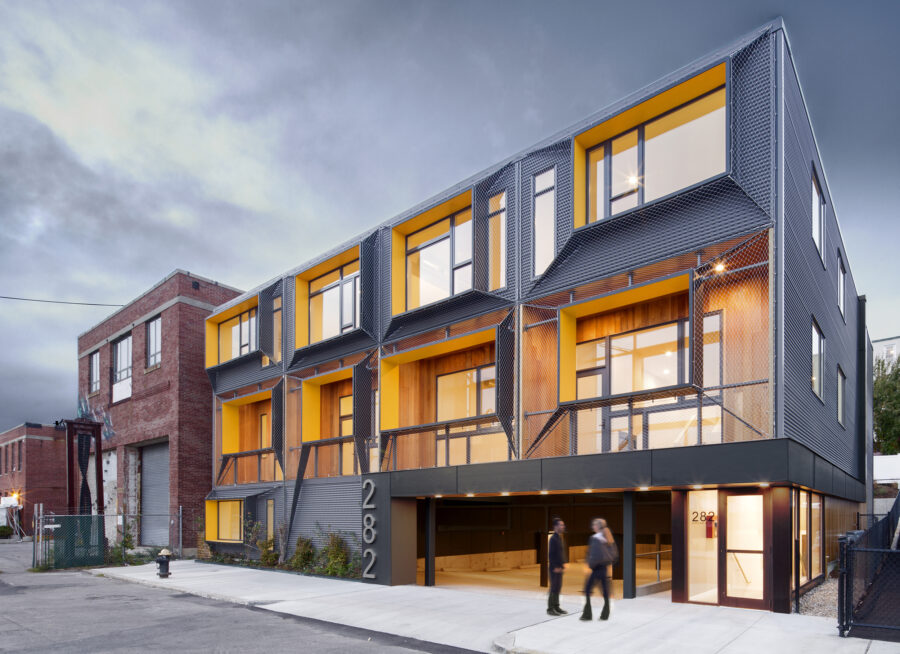 shrink wrap mesh facade east boston shipyard dusk