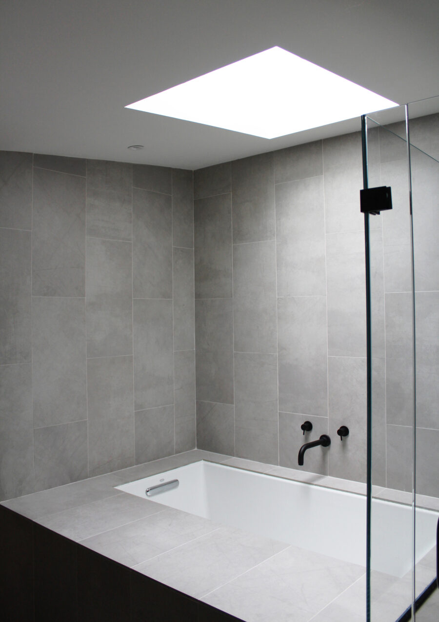 bath tile surround with skylight