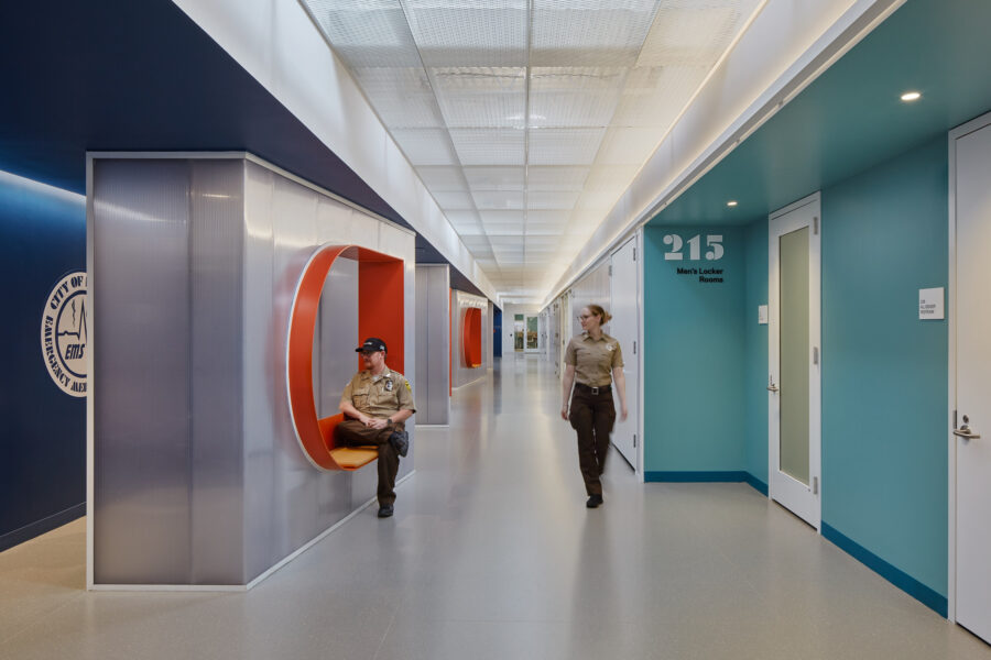 Boston EMS corridor translucent pods mesh ceiling